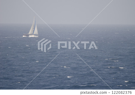 Sailing boat in the Atlantic Ocean. Sailing boat in the Atlantic Ocean. 122082376