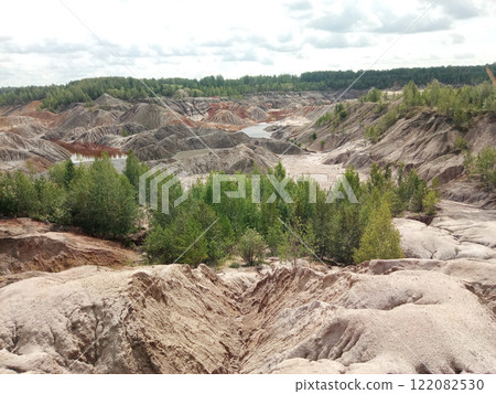 Quarry for the extraction of multi-colored clay in the Ural Mountains Quarry for the extraction of multi-colored clay in the Ural Mountains 122082530
