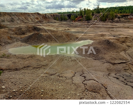 Quarry for the extraction of multi-colored clay in the Ural Mountains Quarry for the extraction of multi-colored clay in the Ural Mountains 122082554