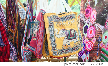 Handmade fabric bag in an ancient Asian tribal style 122083448