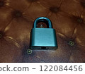Metal Padlock on the table. Security concept 122084456