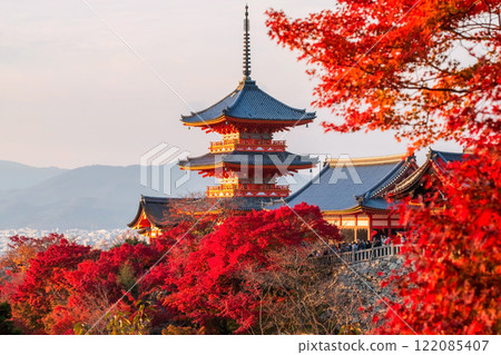 Kiyomizudera temple with red maple autumn foliage at sunset, Kyoto 122085407