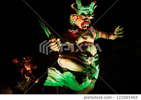 Traditional demon ogoh-ogoh at ritual parade of terrible monsters - Ngrupuk, which is held in evening of Nyepi - Balinese New Year before silence day. Arts and culture of Bali island people. 122085468