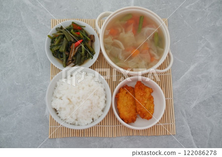 traditional Indonesian food arranged neatly on a table surface 122086278