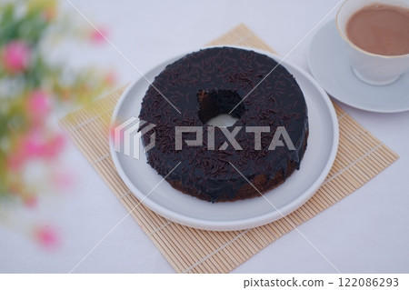 Chocolate cake on plate with white background 122086293