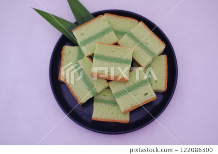 pandan cake on a plate. Selective focus. pandan cake on a plate. Selective focus. 122086300