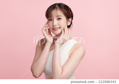 Beautiful young asian woman with clean fresh skin on pink background, Face care, Facial treatment, Cosmetology, beauty and spa, Asian women portrait. 122086343