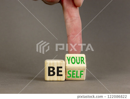 Motivational be yourself symbol. Concept words Be yourself on beautiful wooden block. Beautiful grey background Businessman hand. Business motivational be yourself concept. Copy space. 122086822