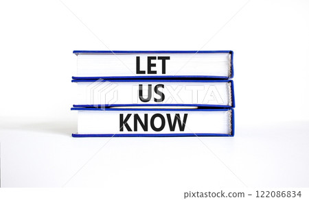 Let us know symbol. Concept words Let us know on books on a beautiful white table white background. Business and let us know concept. Copy space. 122086834