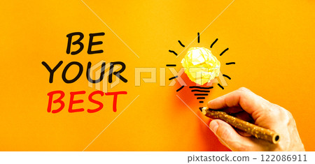 Motivational be your best symbol. Concept words Be your best on beautiful orange paper. Beautiful orange background. Businessman hand. Business motivational be your best concept. Copy space. 122086911