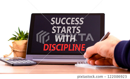 Success starts with discipline symbol. Concept words Success starts with discipline on beautiful black tablet. Beautiful white background. Business success starts with discipline concept. Copy space Success starts with discipline symbol. Concept words Success starts with discipline on beautiful black tablet. Beautiful white background. Business success starts with discipline concept. Copy space 122086923