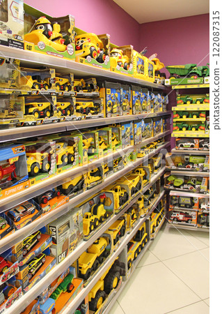Wide selection of toys in children's store. Inside toy shop of model cars 122087315