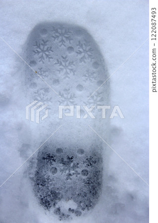 Trace on snow. Fresh snowy shoeprint 122087493