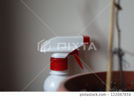 Sprayer for the garden on the windowsill 122087858