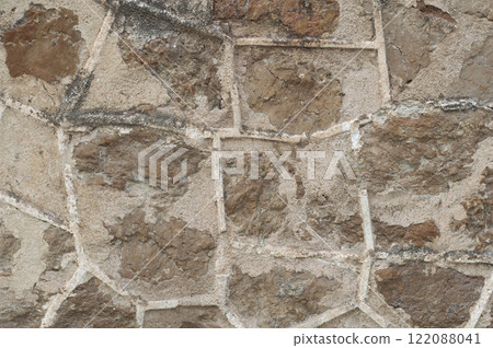 Texture of an old stone wall, backdrop 122088041