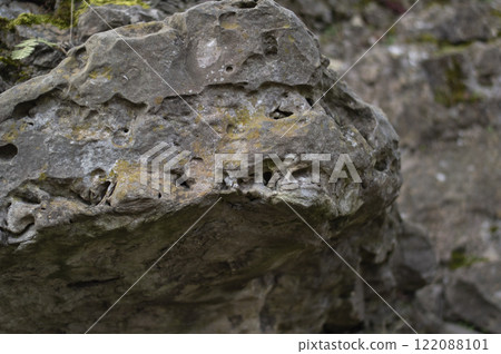 Rock formation in the forest, close-up. Stone texture Rock formation in the forest, close-up. Stone texture 122088101