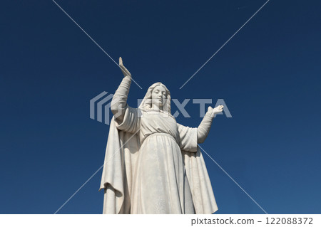 Santa Margherita, Italy - November 13, 2024. Statue to on sky background. Tourism and recreation. Faith and religion.  122088372
