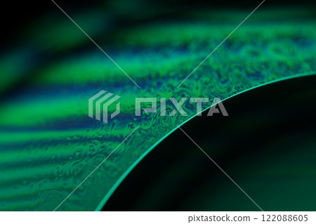 Green liquid surface, fantastic bubbles in the darkness, dark fantastic background, transparent forms, empty space, dark background Green liquid surface, fantastic bubbles in the darkness, dark fantastic background, transparent forms, empty space, dark background 122088605