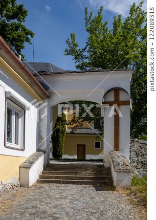 Entrance to the park with a church, Zabreh, Czechia Entrance to the park with a church, Zabreh, Czechia 122089318
