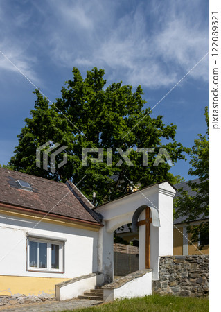 Entrance to the park with a church, Zabreh, Czechia Entrance to the park with a church, Zabreh, Czechia 122089321