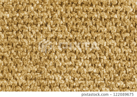 Texture of yellow jacquard fabric of rough weave structure close up, macro, background 122089675