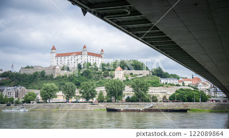 Famous Bratislava Castle landmark shot framed by SNP bridge , Slovakia, Europe 122089864