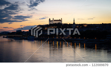 Colorful sunset panorama of Bratislava with Danube river and the Castle shot in Slovakia, Europe Colorful sunset panorama of Bratislava with Danube river and the Castle shot in Slovakia, Europe 122089870