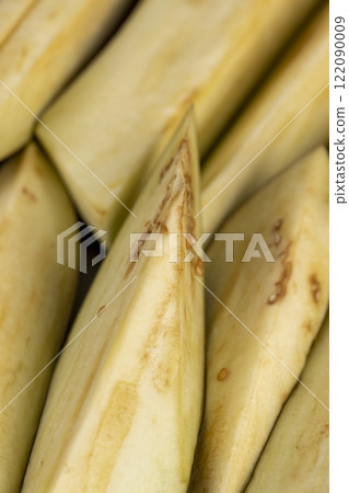 the flesh and seeds of sliced ripe eggplant 122090009