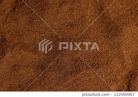 a large amount of ground coffee powder 122090067