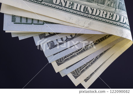 new and old hundred dollar bills stacked together 122090082
