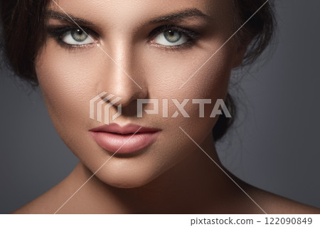 Portrait of young woman with beautiful makeup 122090849
