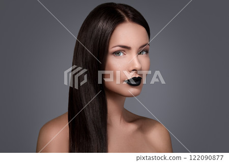 Woman with straight hair and black lips Woman with straight hair and black lips 122090877