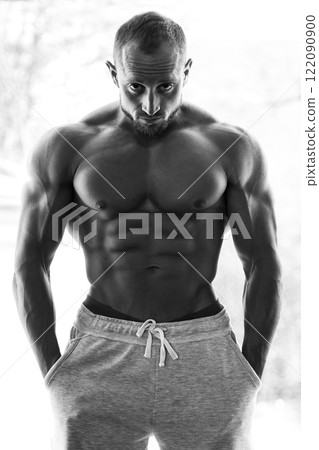 Portrait of Young muscular guy with sexy body 122090900