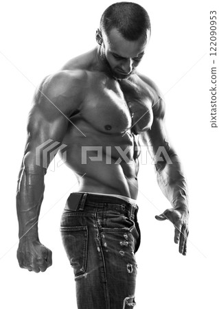 Handsome muscular man wearing jeans posing in studio 122090953