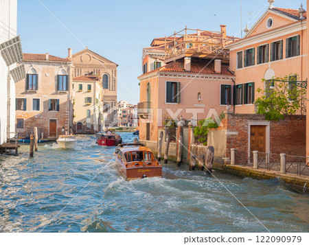 not most popular tourist spot Venice. outskirts city. canals, houses and bridges not most popular tourist spot Venice. outskirts city. canals, houses and bridges 122090979