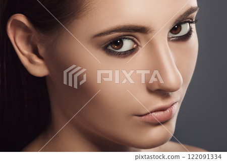 Portrait of beautiful brunette with stylish make-up Portrait of beautiful brunette with stylish make-up 122091334