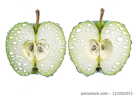Two halves of green apple covered with water droplets on white background 122092051