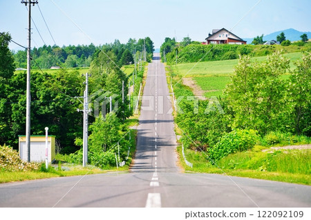 Roller Coaster Road, a famous spot in Kamifurano, Hokkaido 122092109
