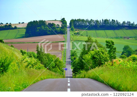 Roller Coaster Road, a famous spot in Kamifurano, Hokkaido 122092124