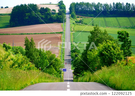 Roller Coaster Road, a famous spot in Kamifurano, Hokkaido 122092125