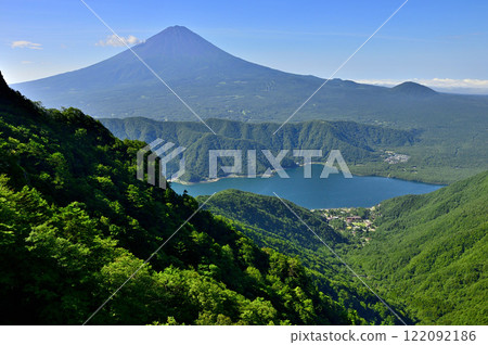 View of Mt. Fuji and Lake Saiko in summer from Mt. Junigatake in the Misaka Mountains View of Mt. Fuji and Lake Saiko in summer from Mt. Junigatake in the Misaka Mountains 122092186