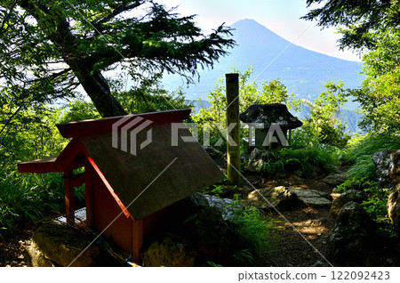 Mount Fuji and a red shrine from the summit of Junigatake in the Misaka Mountains 122092423
