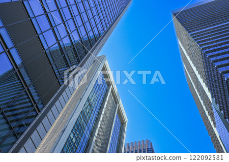Cityscape of an office district looking up at skyscrapers from below Business image Cityscape of an office district looking up at skyscrapers from below Business image 122092581