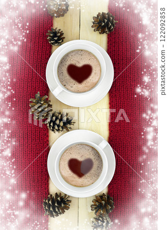 Two cups of hot drink on the winter background. Concept. Two cups of hot drink on the winter background. Concept. 122092858