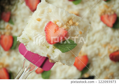 A Delicious Strawberry Dessert with a Refreshing Mint Garnish on Top A Delicious Strawberry Dessert with a Refreshing Mint Garnish on Top 122093973