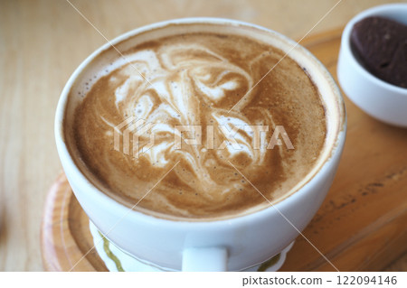 Coffee cup on wood table Coffee cup on wood table 122094146