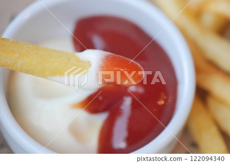 Fries served with Ketchup and a Creamy Dip are beautifully in Focus Fries served with Ketchup and a Creamy Dip are beautifully in Focus 122094340