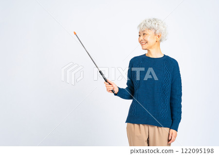 Senior woman with a pointer stick Senior woman with a pointer stick 122095198