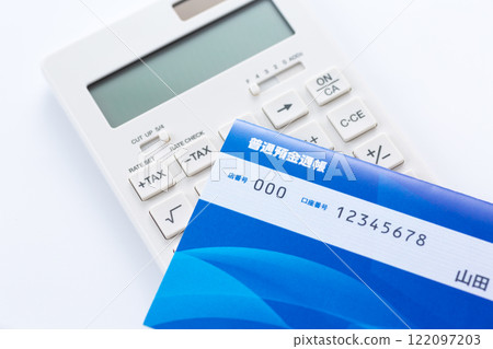 Bankbook and calculator 122097203