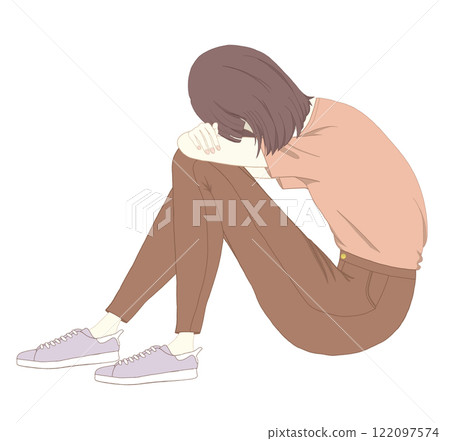 Depressed woman burying her face in her knees 122097574